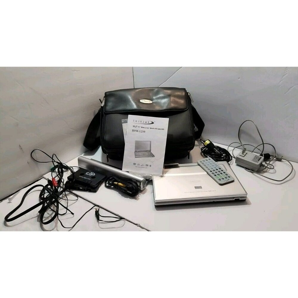 Initial IDM-1210 Portable DVD Player w/Lots of Extras for Parts Only Won't Load